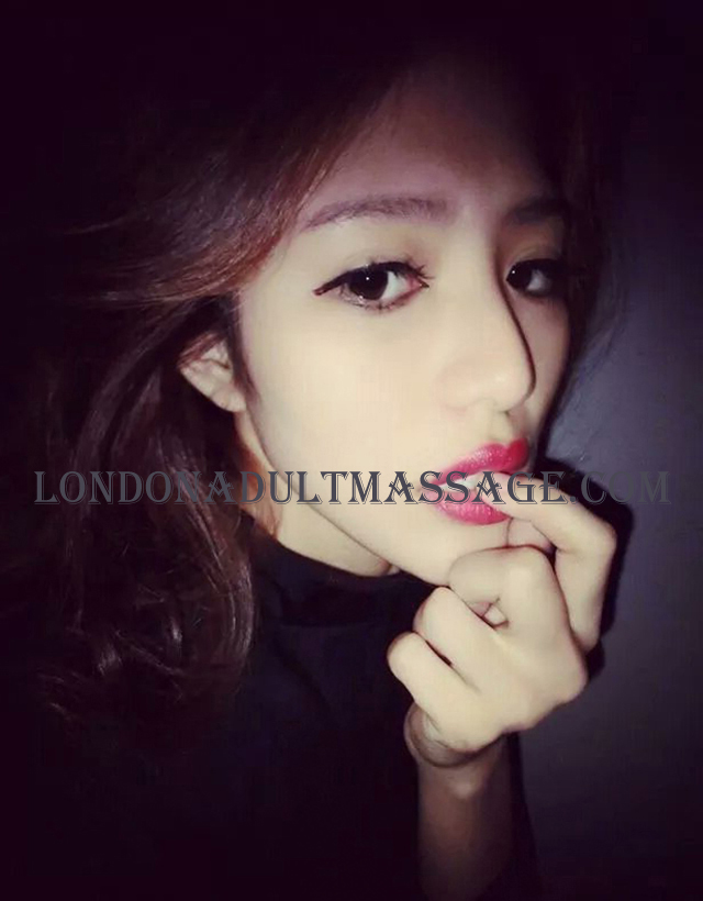 A professional photograph of the independent escort Tiffany Gong.